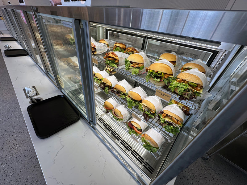 Automated system for preparing and serving hamburgers in a kitchen setting